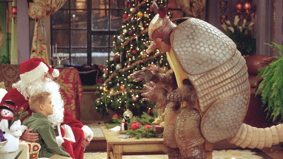 385848 22: Actors Cole Mitchell Sprouse as Ben, Matthew Perry (Santa) as Chandler Bing and David Schwimmer as Ross Geller star in NBC's comedy series "Friends" episode "The One with the Holiday Armadillo." Ross has Ben for the holidays and decides that this season they will celebrate Chanuka instead of Christmas. When ben is disappointed, both Chandler and Ross set out to make the season bright. (Photo by Warner Bros. Television)